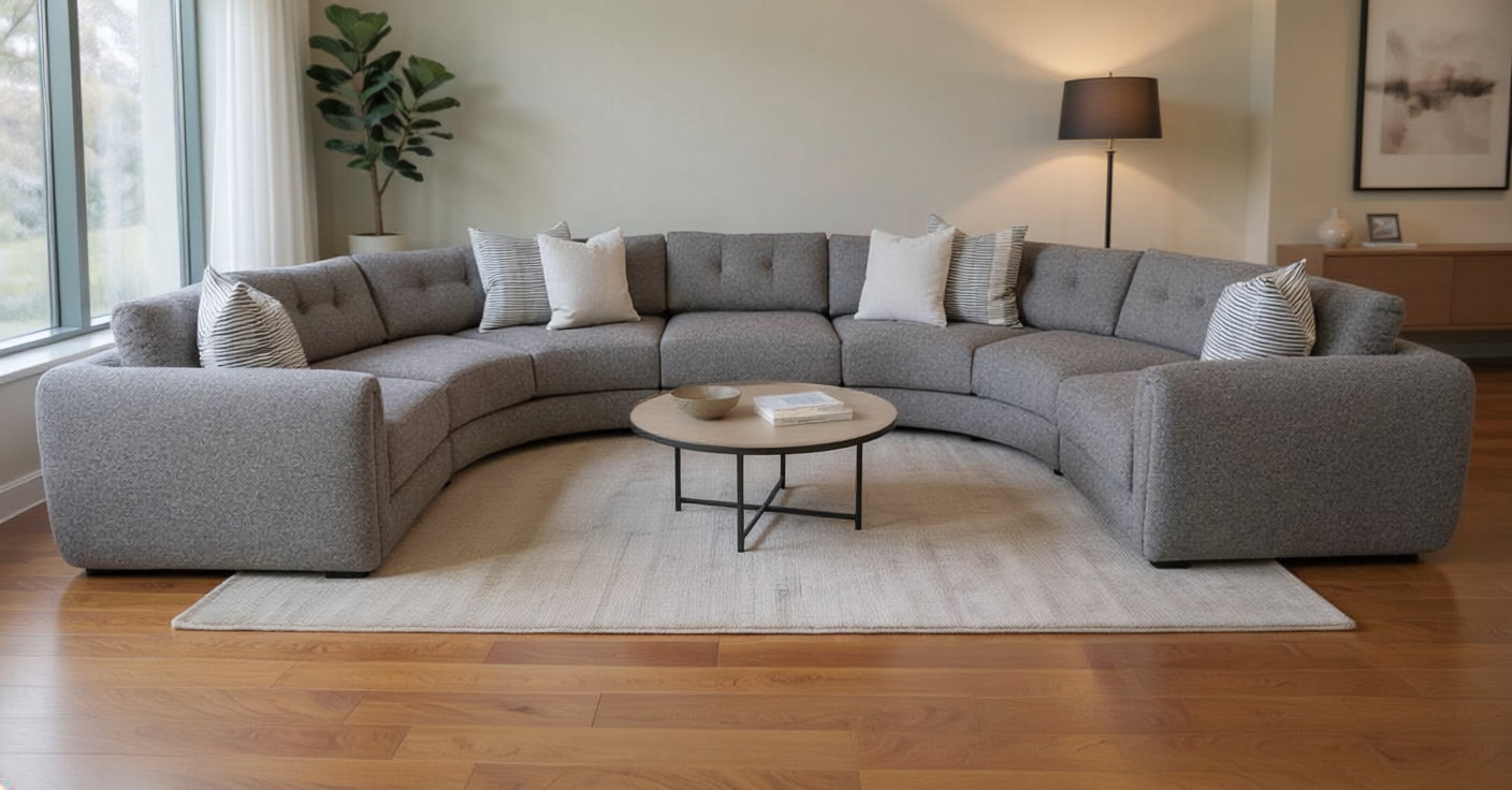 A sculptural sectional upholstered in rich Camel Lux Velvet, with fluid, organic lines creating both comfort and artistry. 